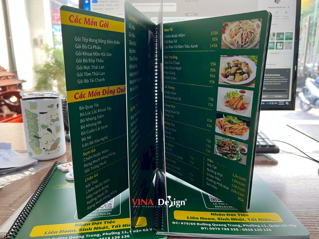Cuốn menu quán ốc ẩm thực đồng quê - In menu nhựa chống nước, đóng gáy lò xo - VINADESIGN