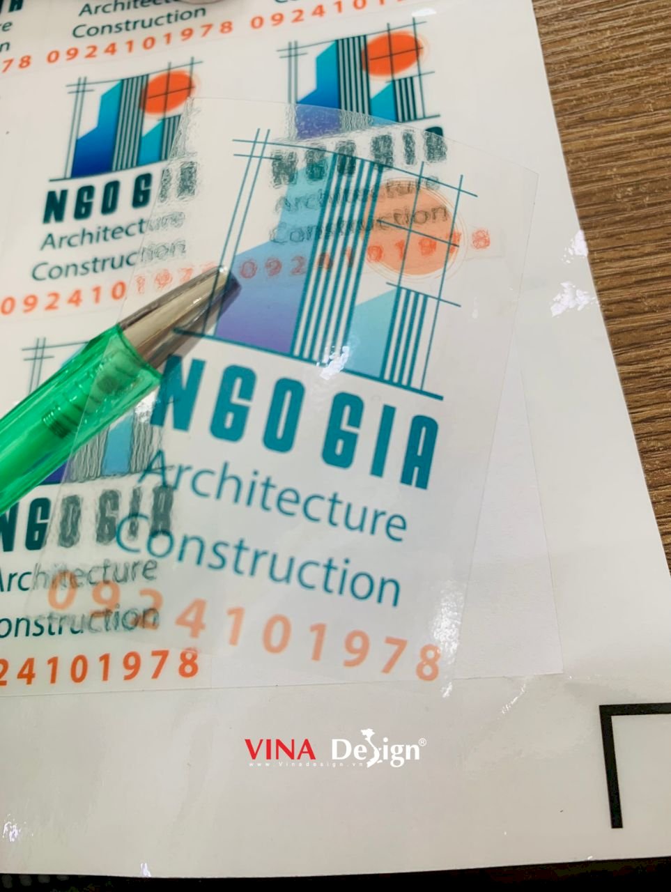 In tem nhãn logo công ty xây dựng, in decal trong suốt mực dầu, cắt bế từng tem - VINADESIGN